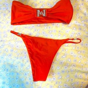 Bright orange two piece bathing suit